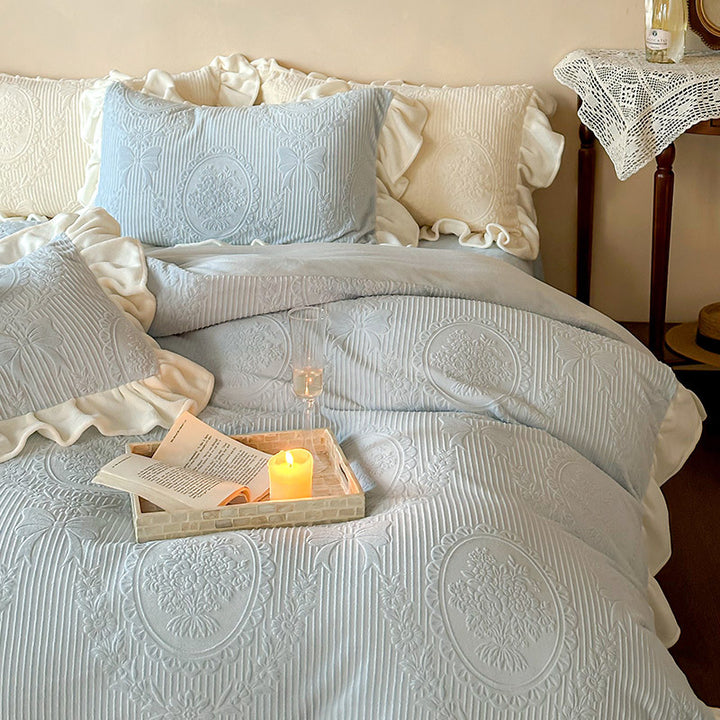 Ruffled quilted bedding set with jacquard medallion and ruffle