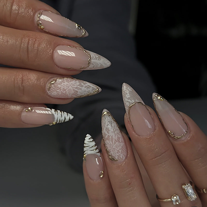 Glamorous stiletto nails with elegant star design Kalsten