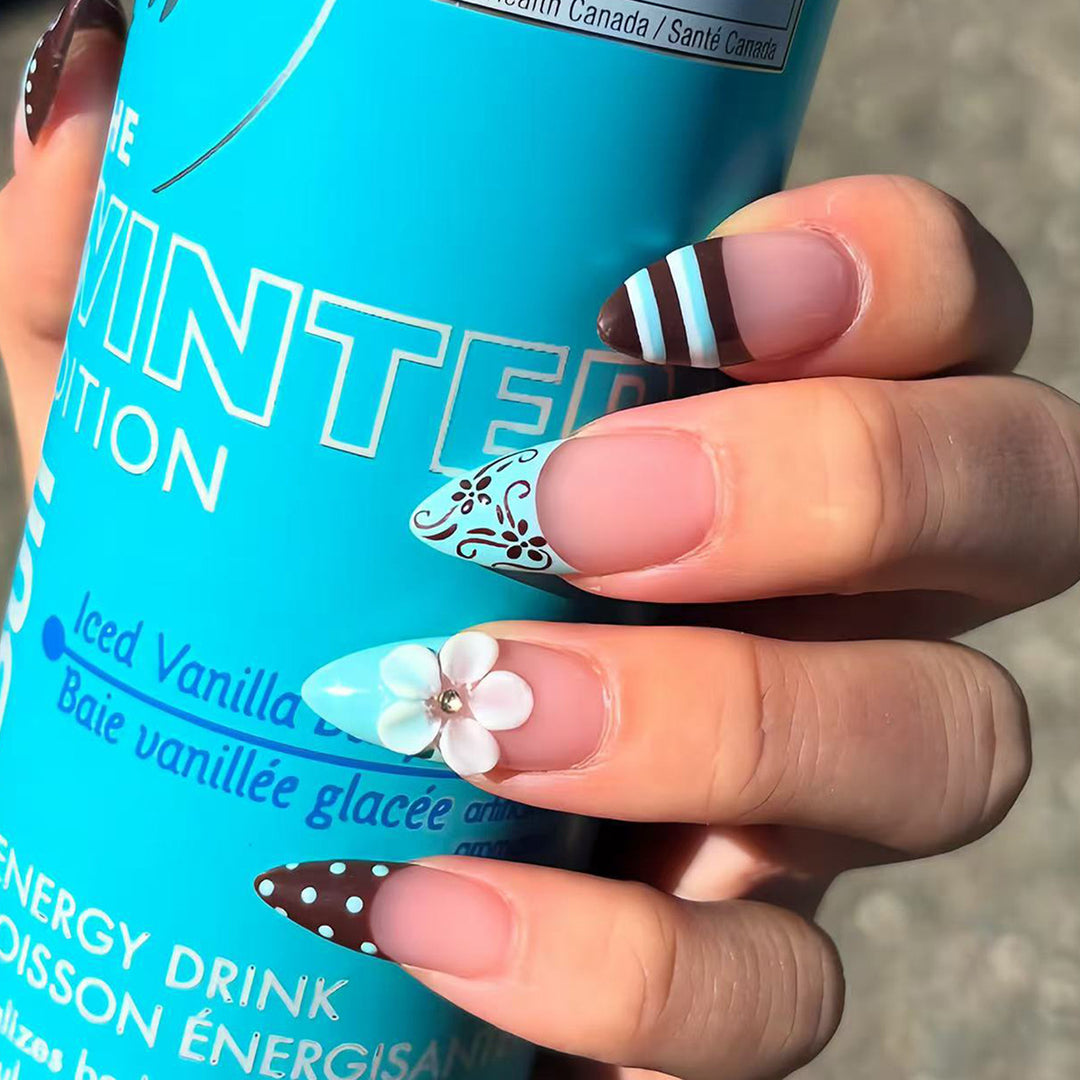 Artificial nails with creative floral design and elegant accent colors Kalsten