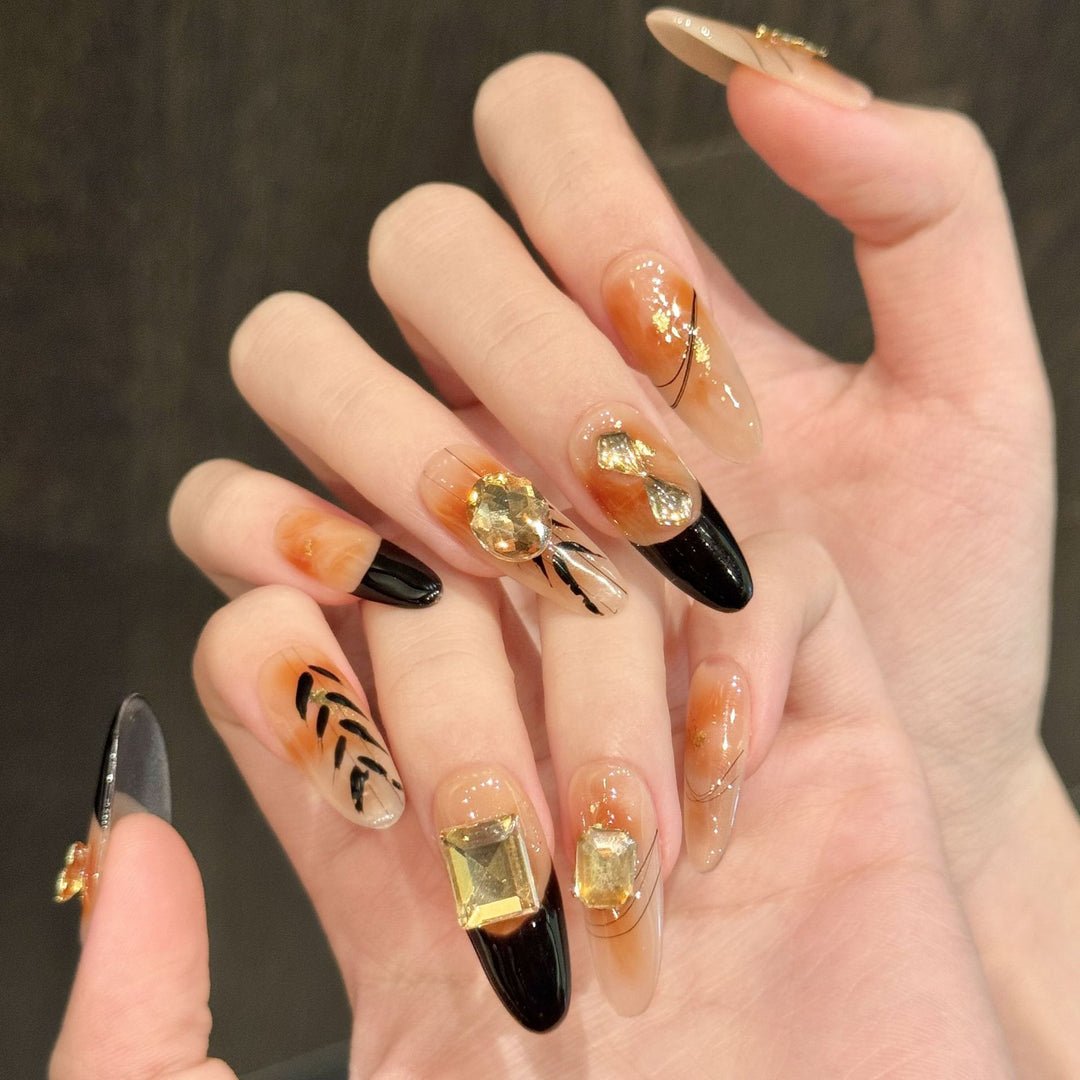 Artistic Gel Press-On Nails with Geometric and Gem Accents