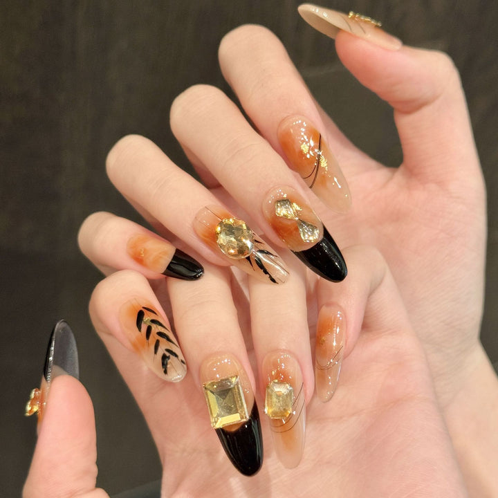 Artistic Gel Press-On Nails with Geometric and Gem Accents