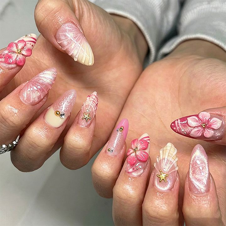 Artificial nail set with glamorous floral designs and creative glitter accents Kalsten