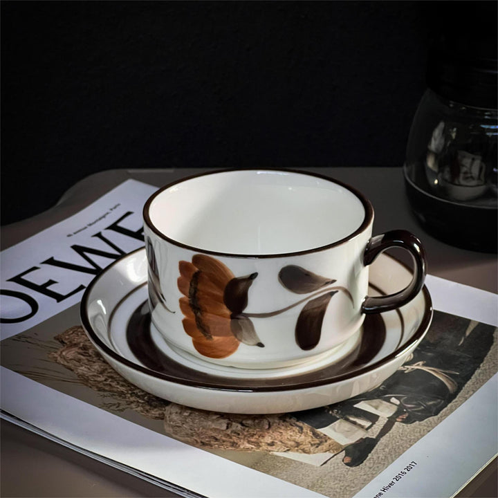 Porcelain cappuccino set with botanical brush painting and elegant rim decoration