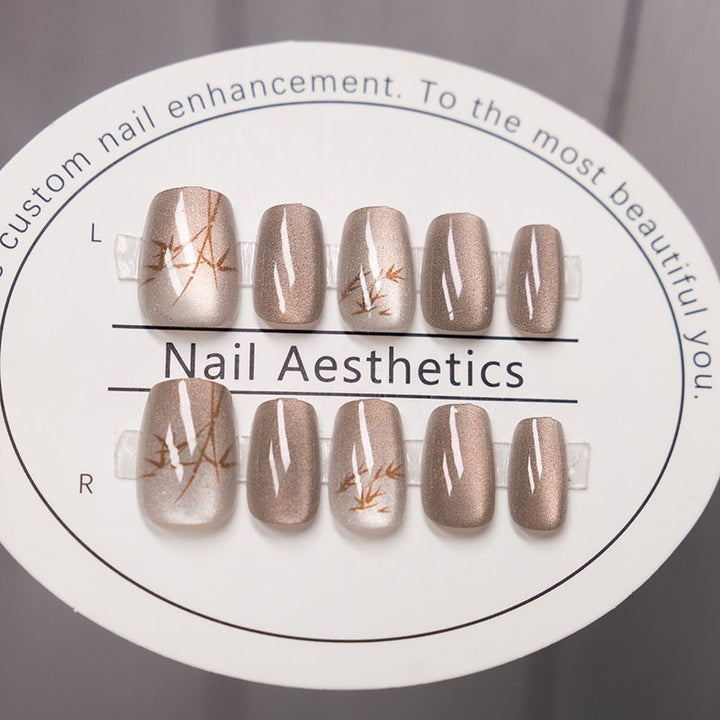 Elegant Press-On Nail Set with Artistic Bamboo Design