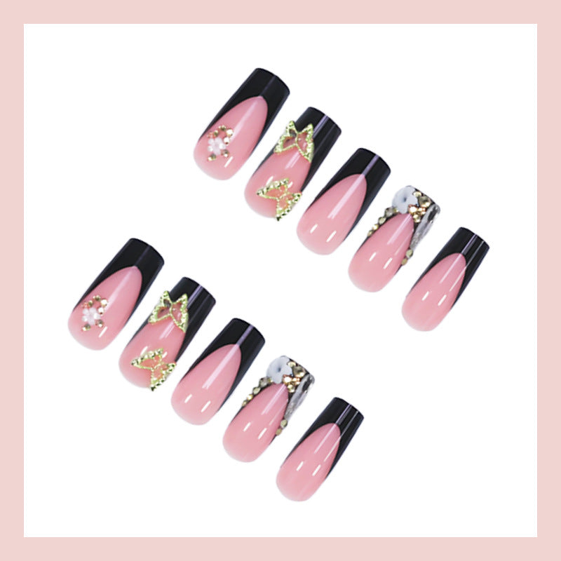 Creative nail art set with romantic floral designs and glamorous accents Kalsten