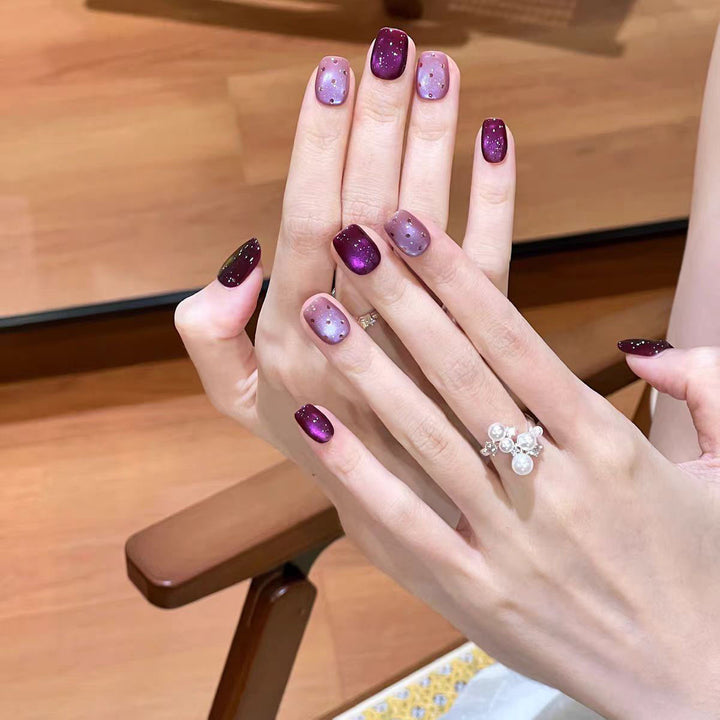 Artificial nails with luxurious ombre effect and sparkling accents Kalsten