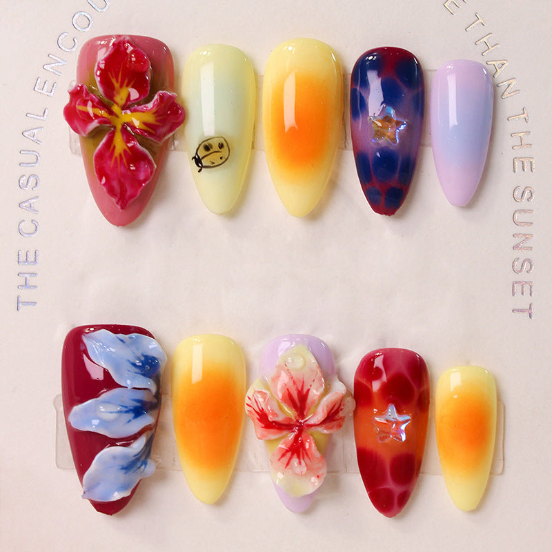 Artificial nail set with floral 3D accents and colorful designs Kalsten