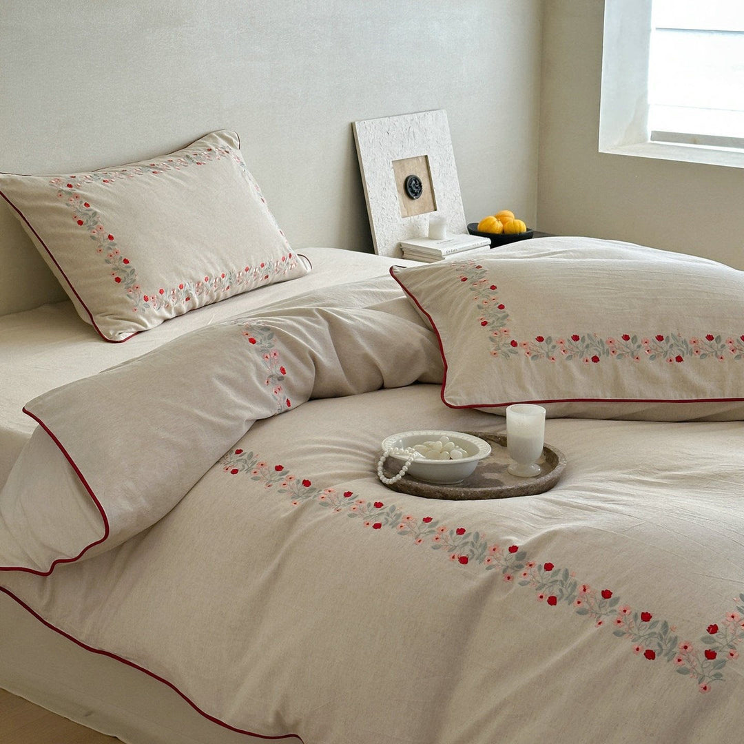 High-quality cotton-linen bed linen set with fine floral embroidery and piping edge