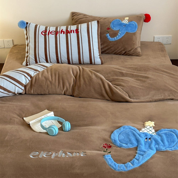 Children's bedding set with elephant applique made of cozy velour and striped cotton side