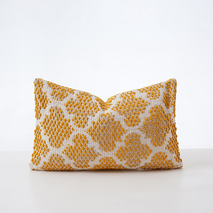 Structured square decorative pillow with crocheted trim and striped knit texture