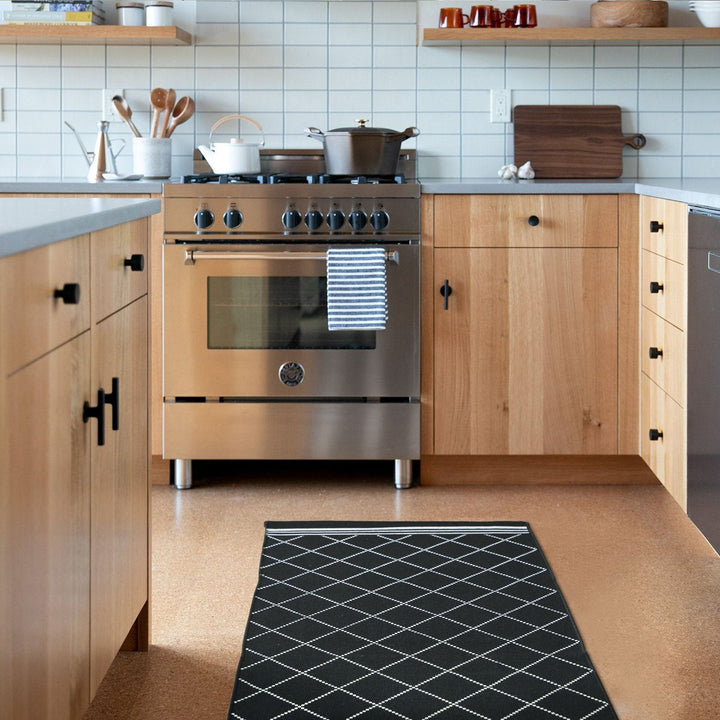 Flat-woven runner rug with diamond pattern and easy-care texture