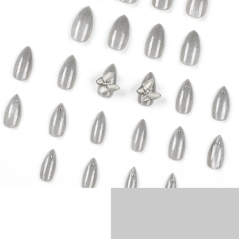 Glamorous stiletto nails with radiant glitter and elegant 3D design Kalsten