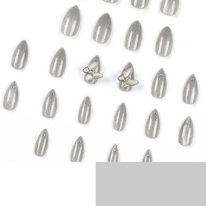 Glamorous stiletto nails with radiant glitter and elegant 3D design Kalsten