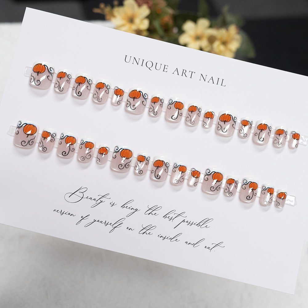 Festive Pumpkin-Themed Nail Art
