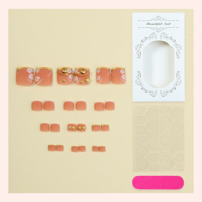 Artificial nail set with elegant, floral accents and golden decorations Kalsten