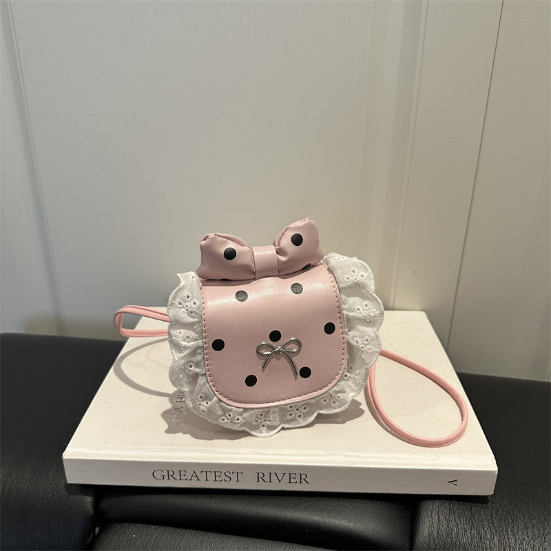 Playful Bow-Embellished Mini Crossbody Bag