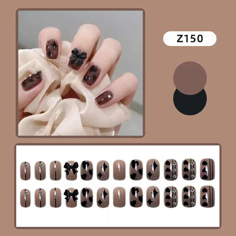Artificial nails with elegant ribbon and heart designs Kalsten