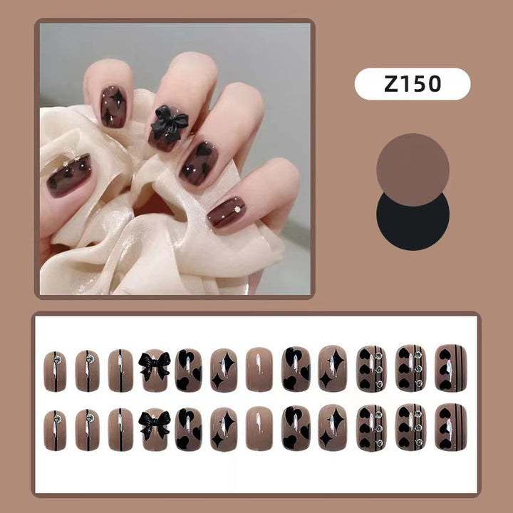 Artificial nails with elegant ribbon and heart designs Kalsten