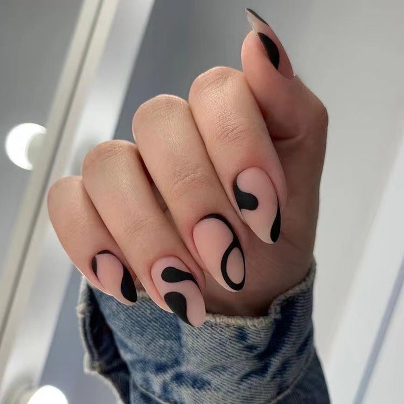 Artful Nail Art with Creative Black-and-White Design Kalsten