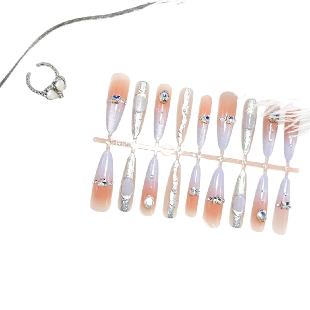 Artificial nails with elegant glitter and crystal accents Kalsten