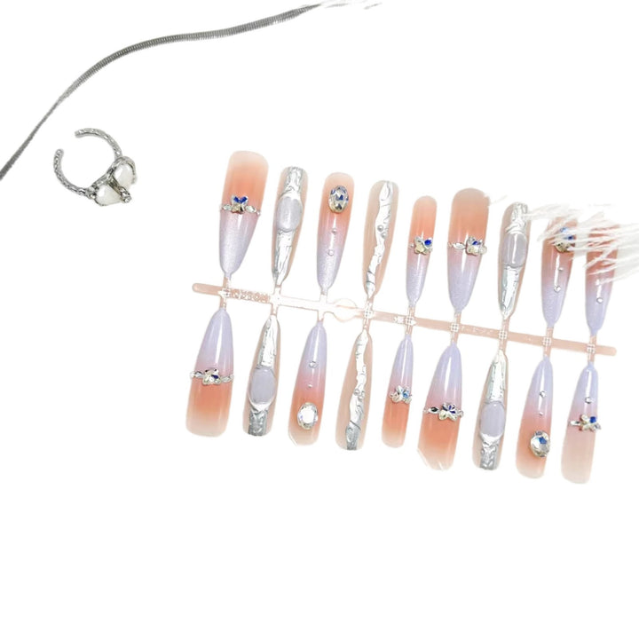 Artificial nails with elegant glitter and crystal accents Kalsten