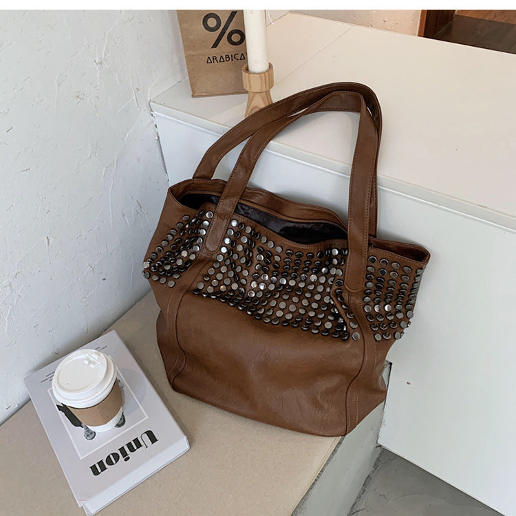 Fashionable shoulder bag with stylish rivet details Kalsten