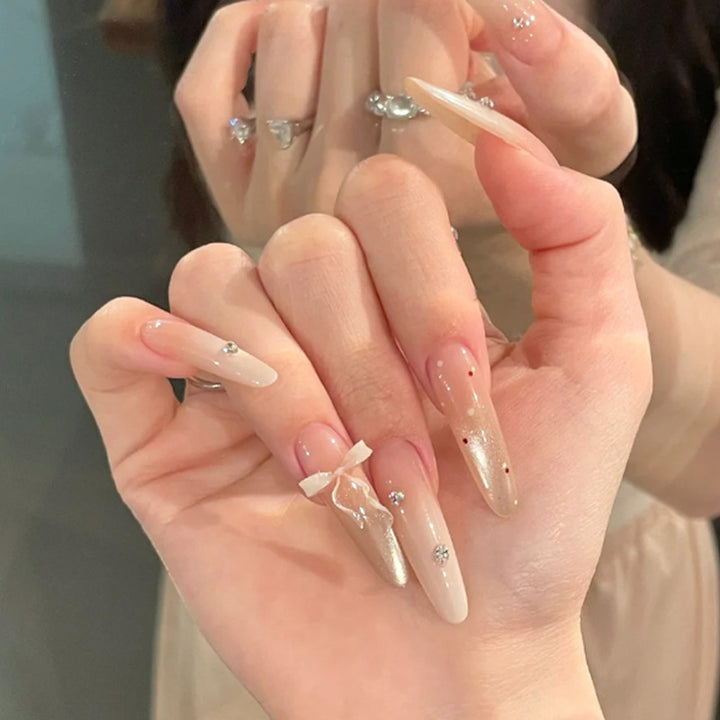 Elegant Stiletto Press-On Nails with Decorative Bow and Rhinestone Accents Kalsten