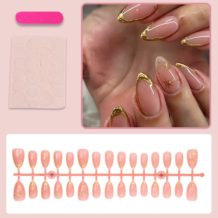 Art nail set with elegant gold accents and romantic star pattern Kalsten