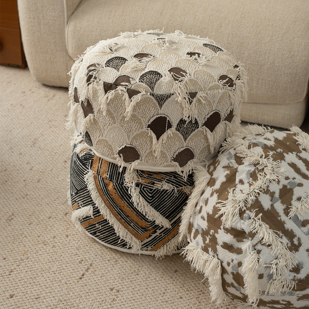 Beef woven seat pouf with boho tassels and textured tufted surface