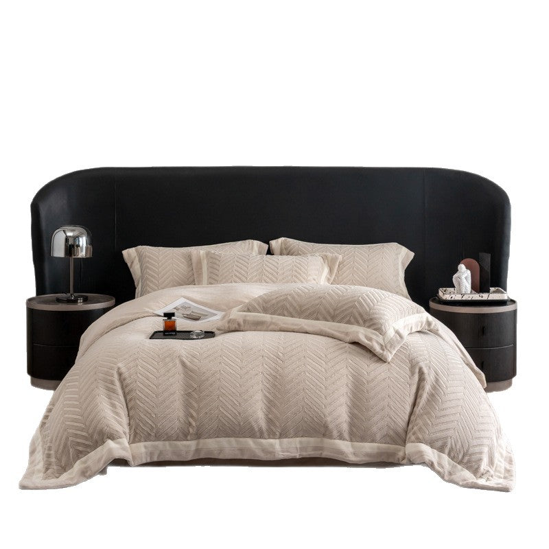 Padded velvet-look bedding set with chevron relief and piping edge