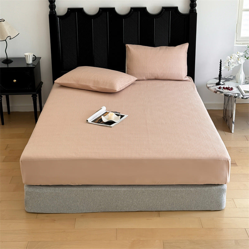 Comfort mattress topper with textured waffle surface and deep edge