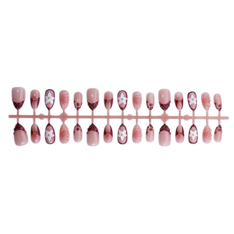 Artificial nail set with floral 3D applications and elegant gradient design Kalsten