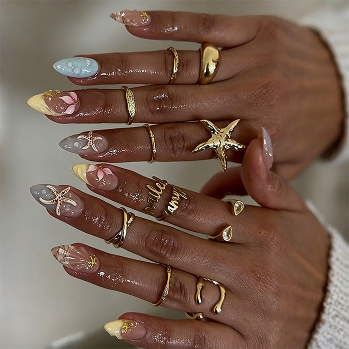 Artificial nail set with floral motifs and glitter accents Kalsten