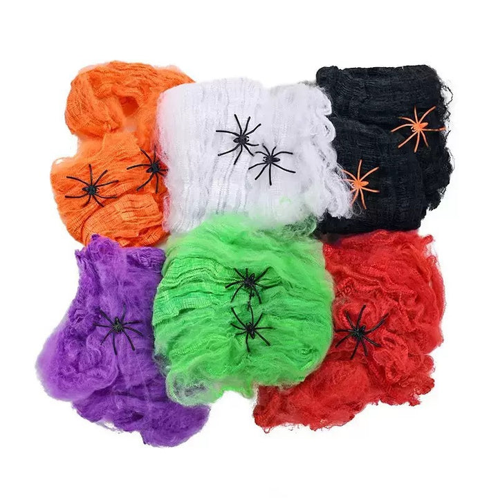 Decorative Halloween spider web with artificial spiders