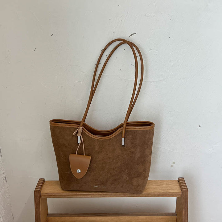 Chic Suede Tote with Decorative Pocket