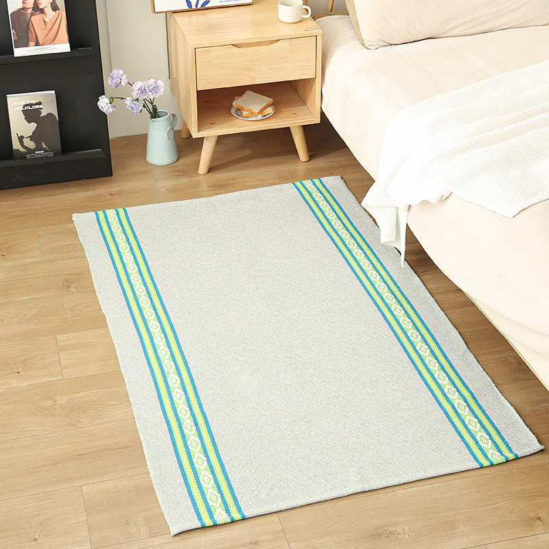 Flat-woven living and bedroom carpet with striped structure and anti-slip backing