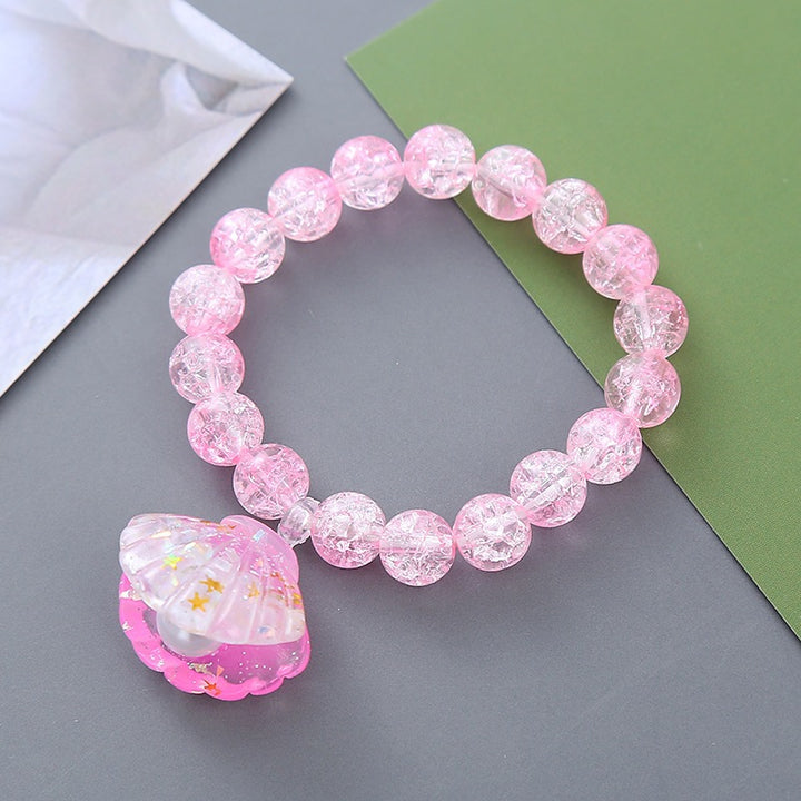 Playful bracelet with shell pendant Kalsten