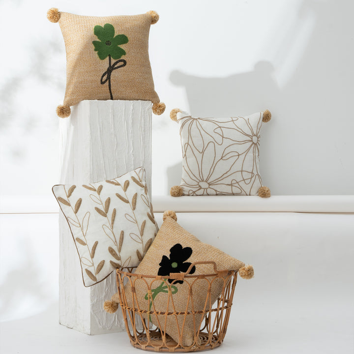 Decorative linen cushion with hand-stitched jute application