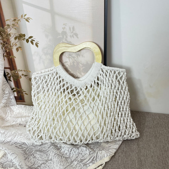Stylish handbag with heart-shaped handle Kalsten