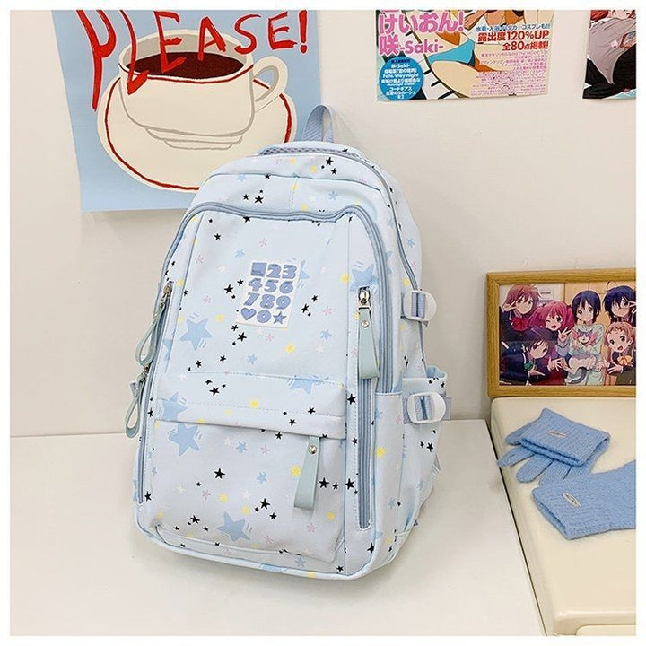 Playful backpack with star motifs and practical functions Kalsten