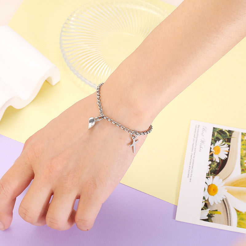 Versatile bracelet with cross and heart pendants Kalsten