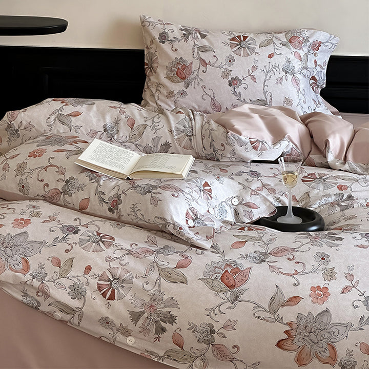 Luxurious satin bedding set with delicate rose patterns and button placket