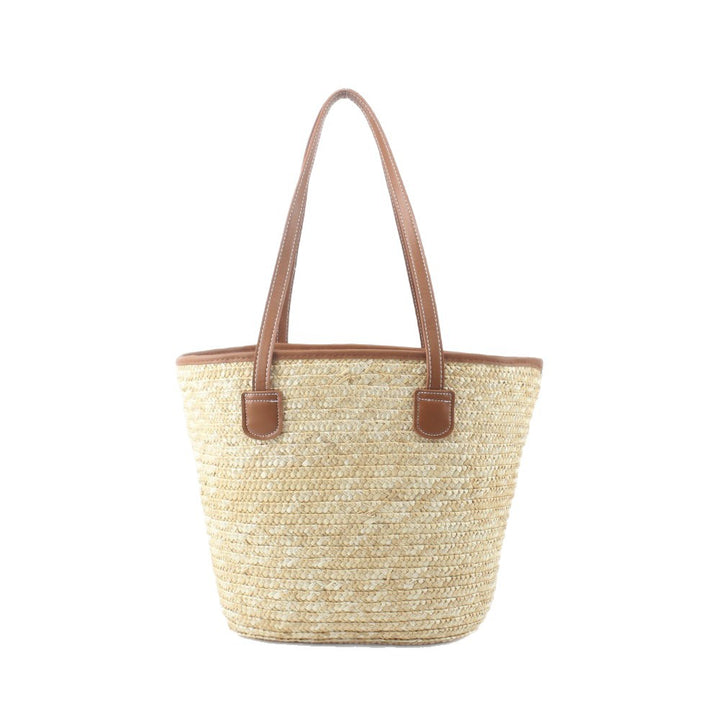 Braided basket bag with elegant leather handles Kalsten