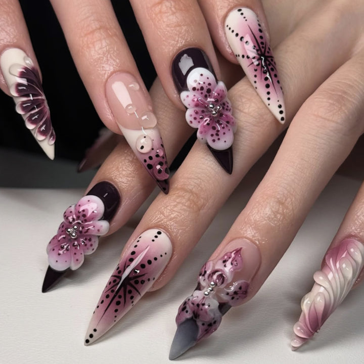Artistic stiletto nails with floral 3D embellishments Kalsten