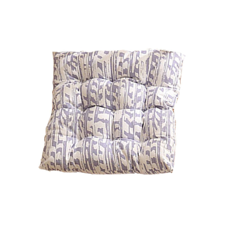 Padded quilted seat cushion with colorful button applications and non-slip underside Kalsten