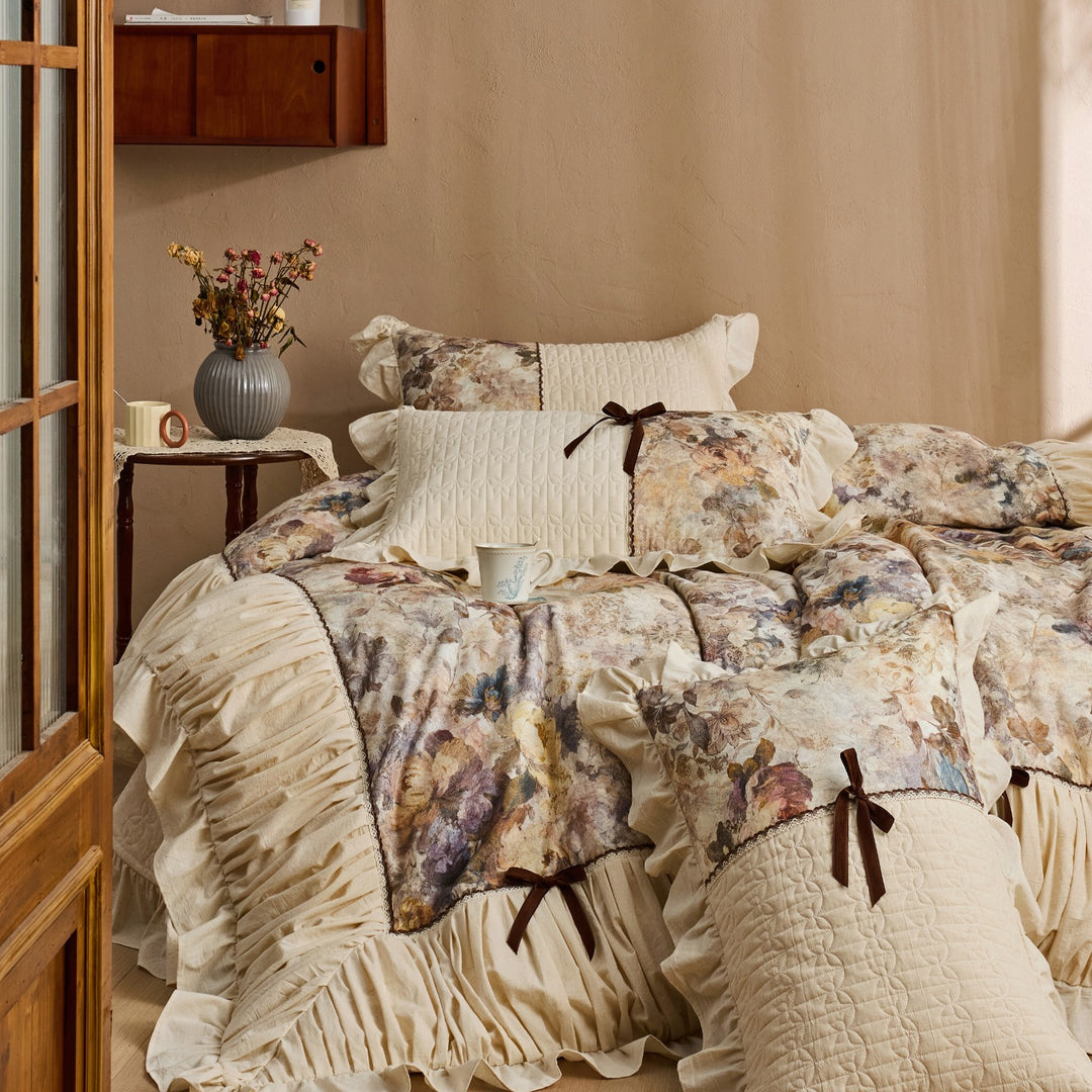 Romantic bedding set with frill, quilted panels and floral watercolor look
