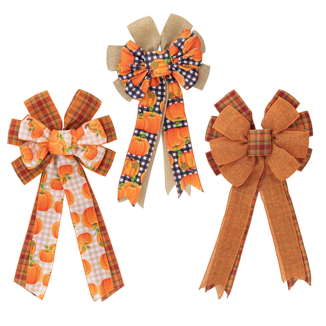 Large autumn door bow made of jute with pumpkin print and gingham ribbons
