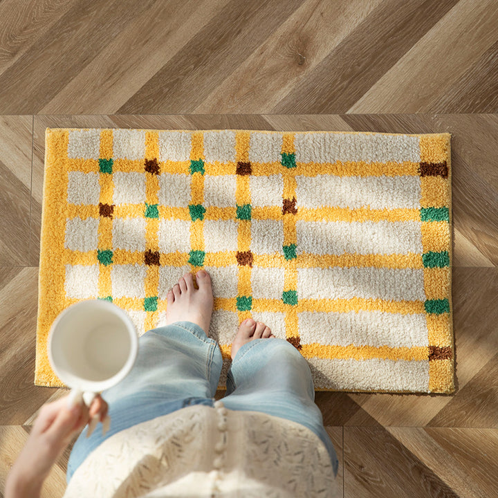 High-pile bath mat with geometric check tufting