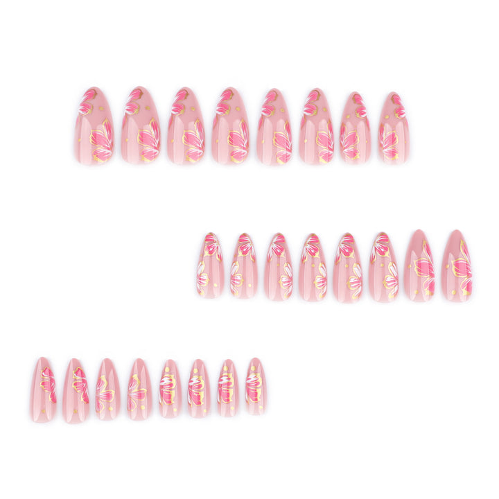 Artful nail art with elegant floral designs and gold accents Kalsten