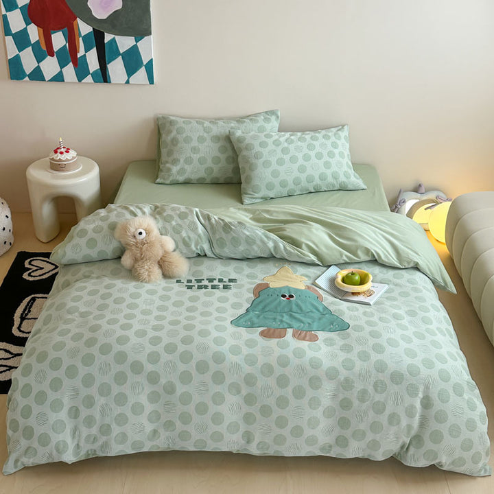 Child-friendly bedding set with embroidered rabbit motif and dotted woven texture
